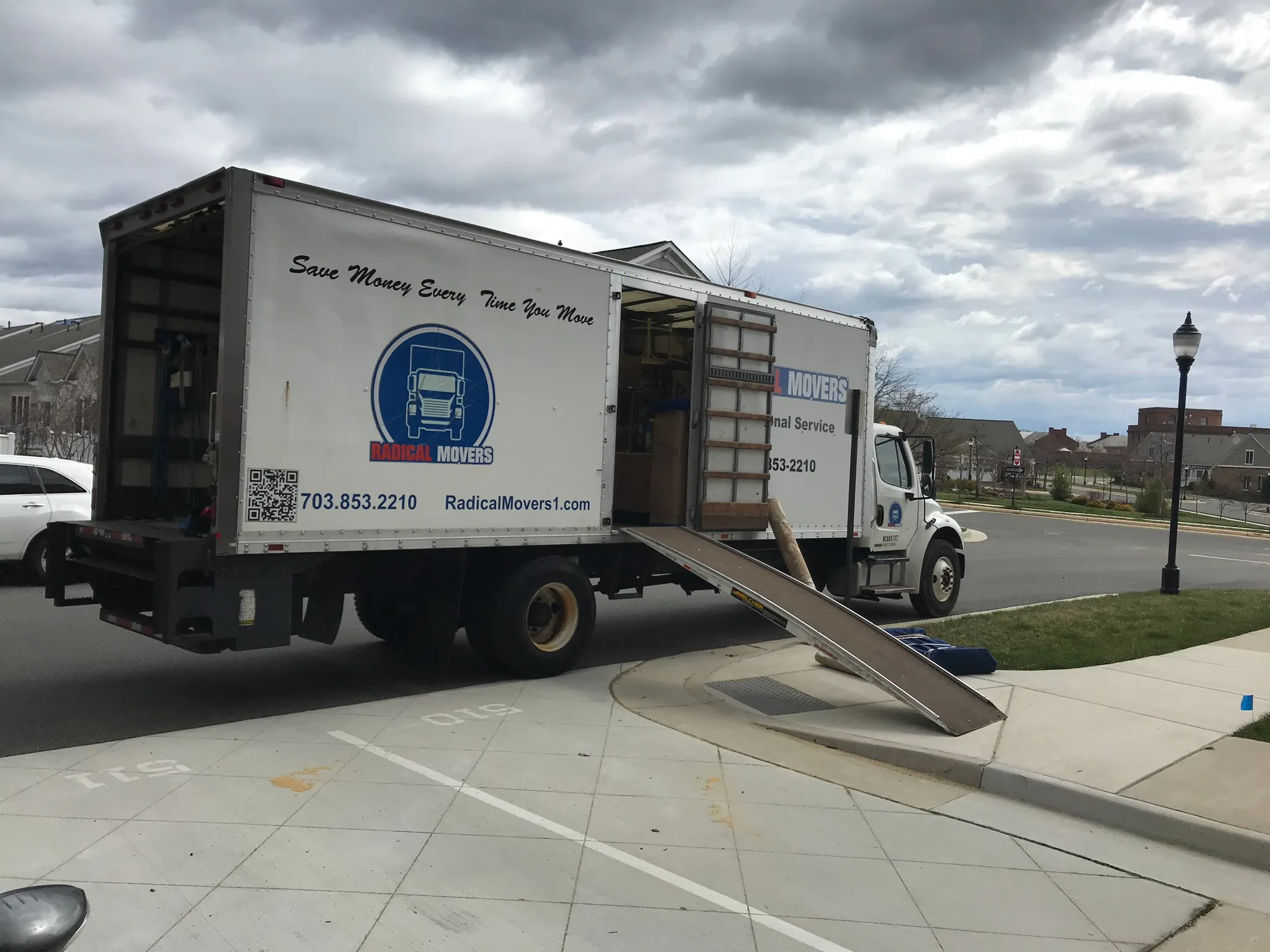 Professional junk removal team loading unwanted items into truck